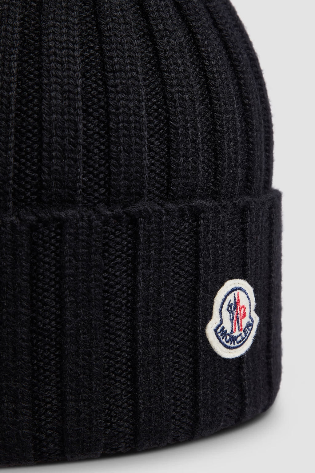 Bonnet en laine avec pompon Noir